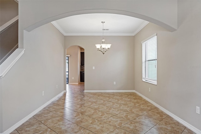 10808 Whitecap Dr, Riverview, FL 33579 - empty room with crown molding, arched walkways, and a chandelier