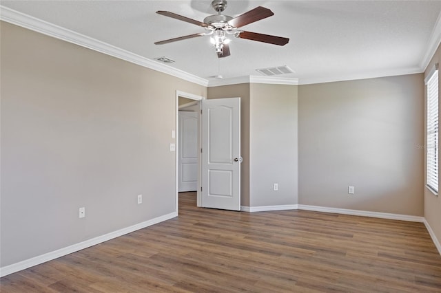 10808 Whitecap Dr, Riverview, FL 33579 - unfurnished room featuring ceiling fan, ornamental molding, and wood finished floors