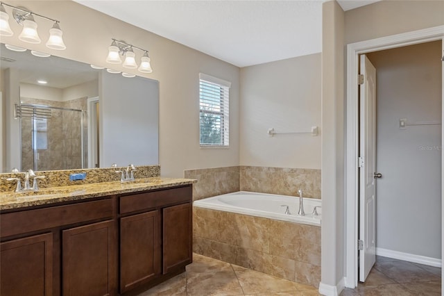 10808 Whitecap Dr, Riverview, FL 33579 - bathroom with a shower stall, a bath, tile patterned floors, and double vanity