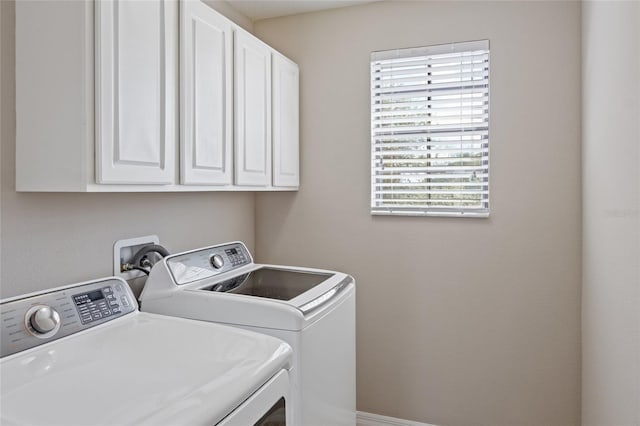 10808 Whitecap Dr, Riverview, FL 33579 - laundry room with separate washer and dryer and cabinet space