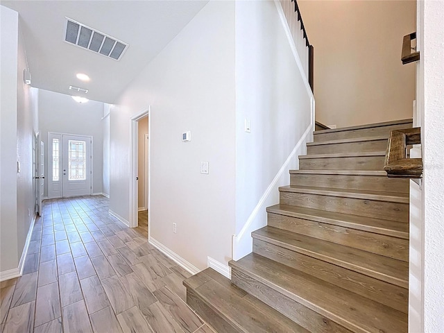 3063 Marine Grass Dr, Wimauma, FL 33598 - stairs with baseboards and wood finished floors