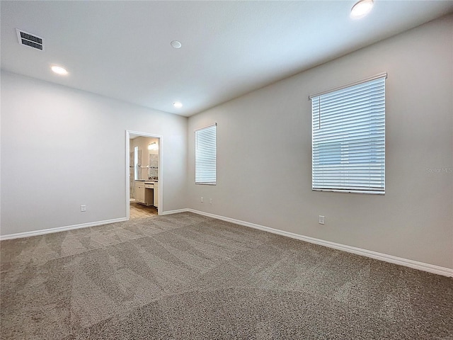 3063 Marine Grass Dr, Wimauma, FL 33598 - unfurnished room featuring baseboards, carpet flooring, and recessed lighting