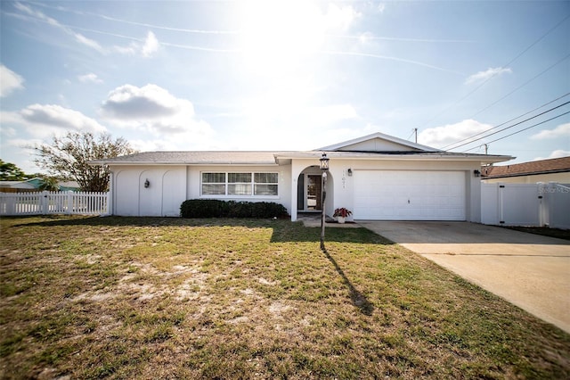 11071 141st St, Largo, FL 33774 - ranch-style house featuring an attached garage, driveway, and stucco siding