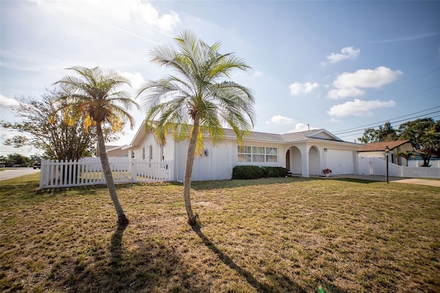 11071 141st St, Largo, FL 33774 - single story home with an attached garage, concrete driveway, and stucco siding