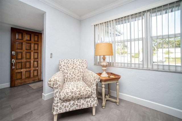 11071 141st St, Largo, FL 33774 - living area featuring baseboards, crown molding, and wood finished floors