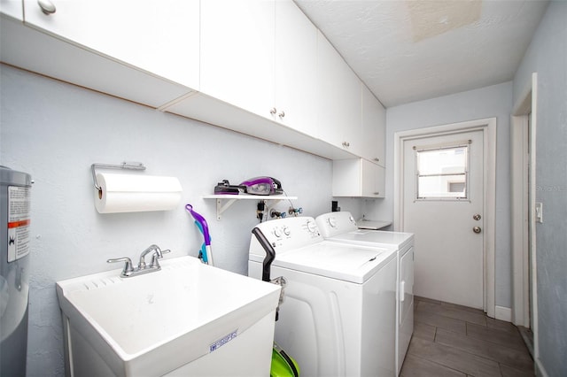 11071 141st St, Largo, FL 33774 - washroom featuring independent washer and dryer, cabinet space, and water heater