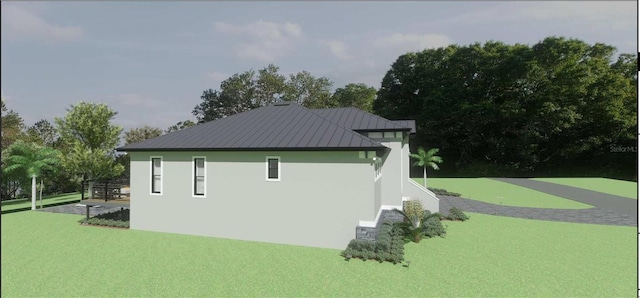 17282 Carroway Ln, Punta Gorda, FL 33955 - view of property exterior featuring stucco siding and a lawn