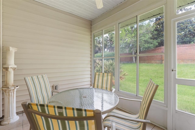 13200 W Newberry Rd Unit B8, Newberry, FL 32669 - sunroom / solarium featuring a ceiling fan, outdoor dining space, and healthy amount of natural light