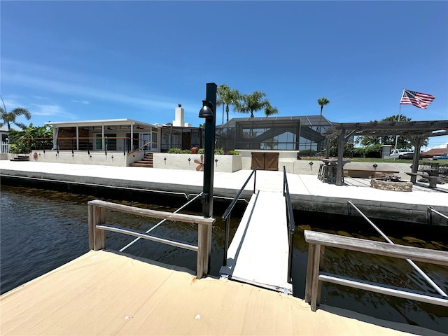 3654 Corsair Ct, New Port Richey, FL 34652 - dock featuring boat lift, a lanai, and a water view