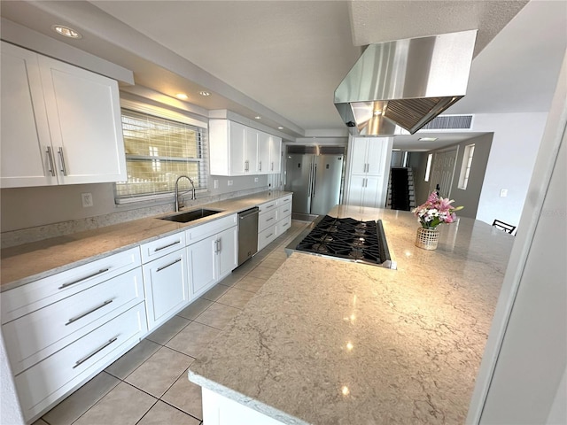 3654 Corsair Ct, New Port Richey, FL 34652 - kitchen featuring a sink, stainless steel appliances, white cabinets, light stone countertops, and island exhaust hood