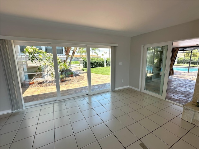 3654 Corsair Ct, New Port Richey, FL 34652 - unfurnished room featuring baseboards and light tile patterned floors