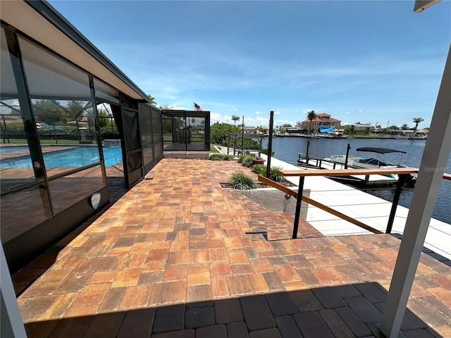 3654 Corsair Ct, New Port Richey, FL 34652 - dock area with a water view, glass enclosure, an outdoor pool, and a patio area