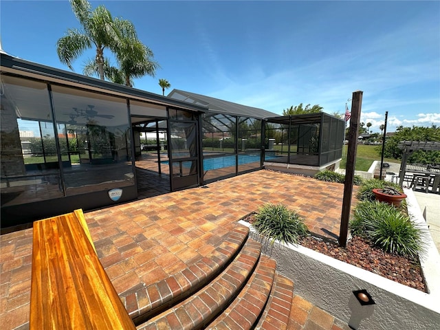3654 Corsair Ct, New Port Richey, FL 34652 - view of patio / terrace featuring a swimming pool and glass enclosure