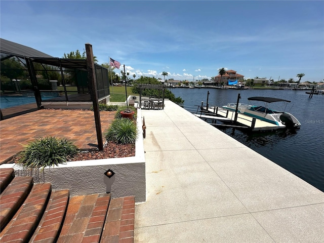 3654 Corsair Ct, New Port Richey, FL 34652 - dock area featuring a water view and glass enclosure