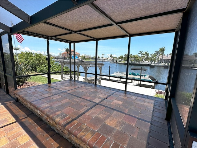 3654 Corsair Ct, New Port Richey, FL 34652 - view of patio featuring a water view, a boat dock, and boat lift