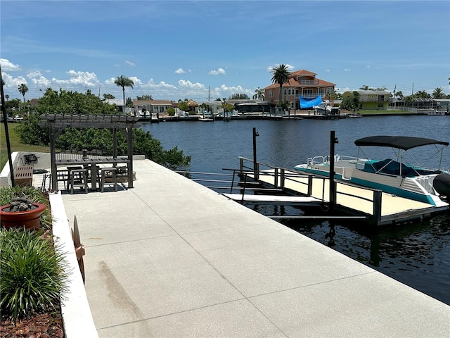 3654 Corsair Ct, New Port Richey, FL 34652 - dock featuring a pergola, a water view, and a patio area