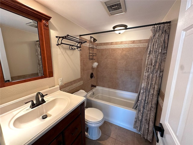 3654 Corsair Ct, New Port Richey, FL 34652 - bathroom with toilet, vanity, shower / bath combo, and tile patterned floors