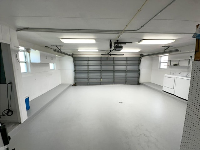 3654 Corsair Ct, New Port Richey, FL 34652 - garage featuring separate washer and dryer and a garage door opener