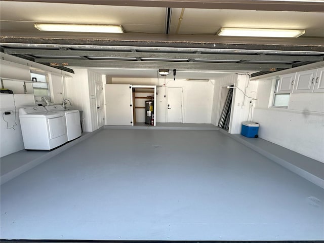 3654 Corsair Ct, New Port Richey, FL 34652 - garage with independent washer and dryer, electric water heater, and a garage door opener