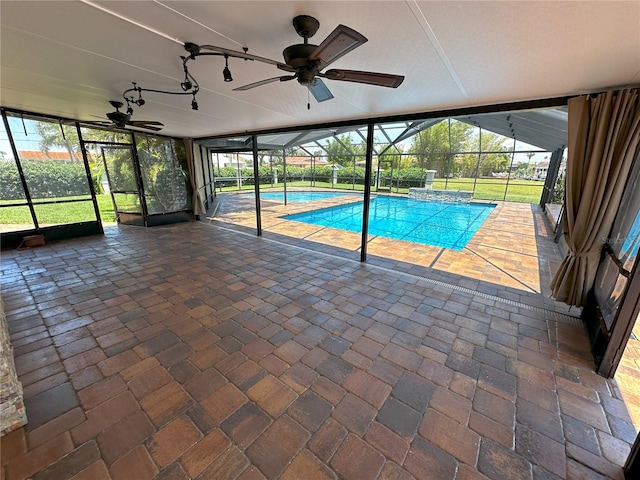 3654 Corsair Ct, New Port Richey, FL 34652 - swimming pool featuring a ceiling fan, a lanai, and a patio area