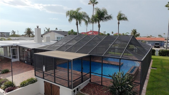 3654 Corsair Ct, New Port Richey, FL 34652 - outdoor pool featuring a patio and a lanai