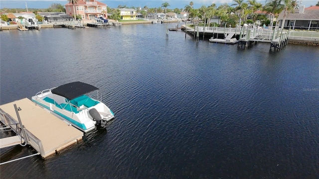 3654 Corsair Ct, New Port Richey, FL 34652 - dock area featuring a water view and a residential view