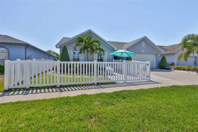 214 Lookout Dr, Apollo Beach, FL 33572 - view of front of home featuring driveway and an attached garage