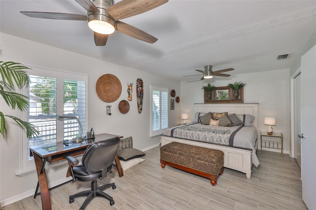 214 Lookout Dr, Apollo Beach, FL 33572 - bedroom featuring baseboards, light wood-style floors, a desk, and ceiling fan
