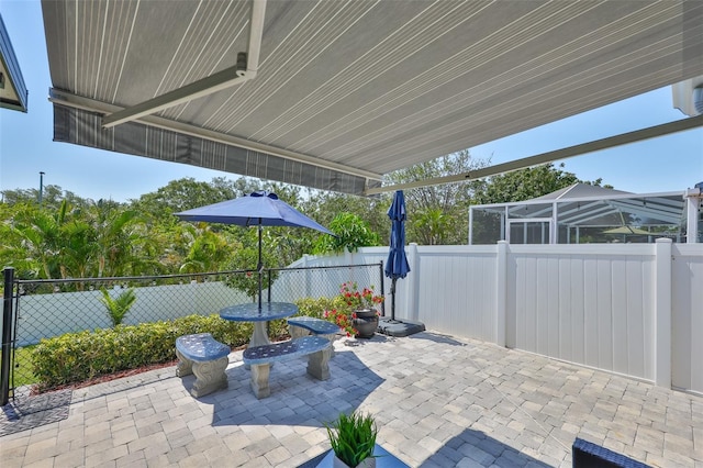 214 Lookout Dr, Apollo Beach, FL 33572 - fenced backyard with a patio area