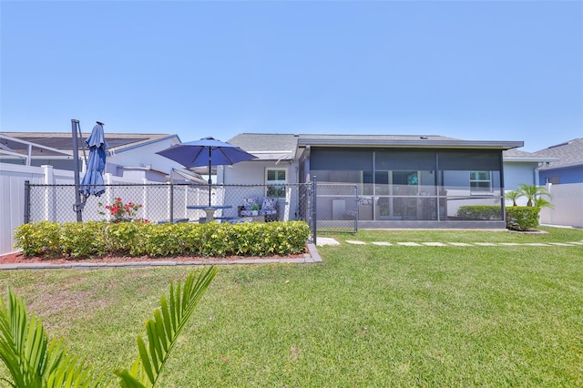 214 Lookout Dr, Apollo Beach, FL 33572 - back of house with a sunroom