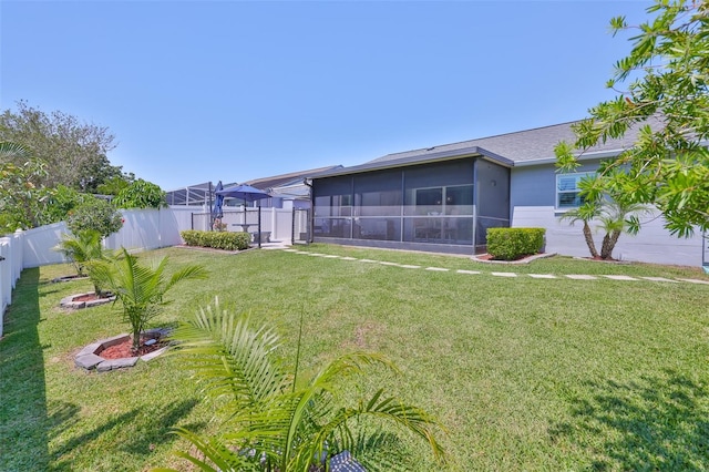 214 Lookout Dr, Apollo Beach, FL 33572 - view of yard featuring a sunroom
