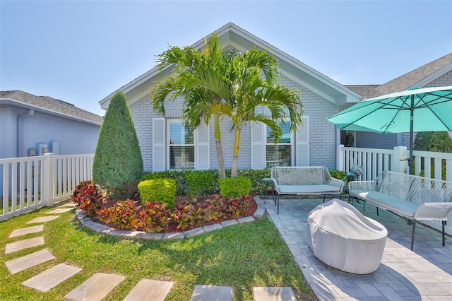 214 Lookout Dr, Apollo Beach, FL 33572 - view of yard with an outdoor living space and a patio area