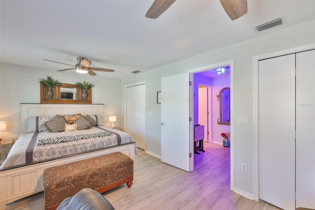 214 Lookout Dr, Apollo Beach, FL 33572 - bedroom with light wood-type flooring, baseboards, and ceiling fan