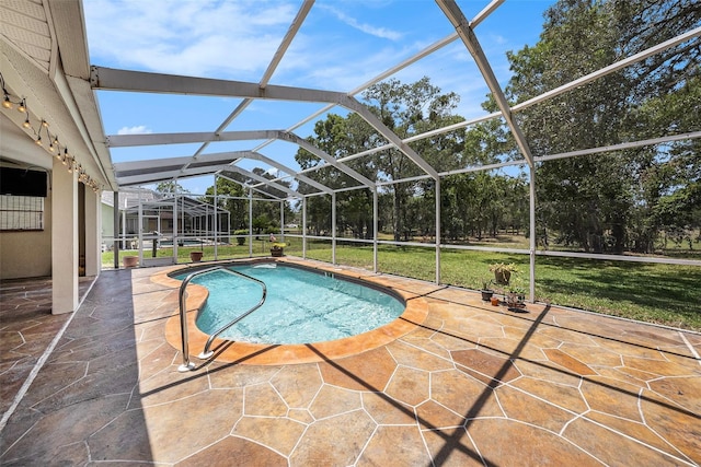 14181 Cornewall Ln, Spring Hill, FL 34609 - swimming pool with a patio, a yard, and glass enclosure