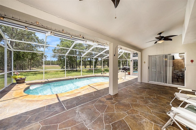 14181 Cornewall Ln, Spring Hill, FL 34609 - swimming pool with ceiling fan, a patio, a lanai, and a yard