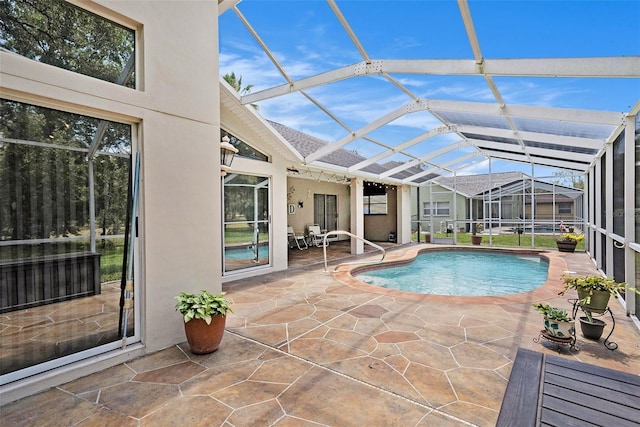 14181 Cornewall Ln, Spring Hill, FL 34609 - outdoor pool featuring a patio, a lanai, and a ceiling fan