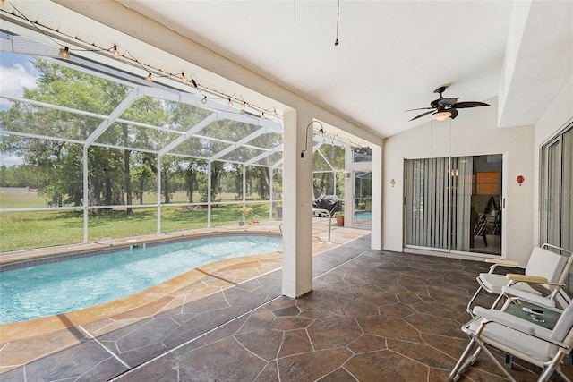 14181 Cornewall Ln, Spring Hill, FL 34609 - swimming pool featuring ceiling fan, a patio area, and a lanai