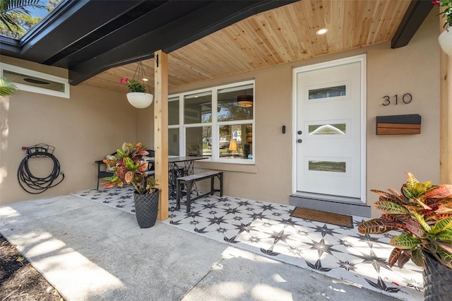 310 55th Ave S, Saint Petersburg, FL 33705 - entrance to property featuring stucco siding