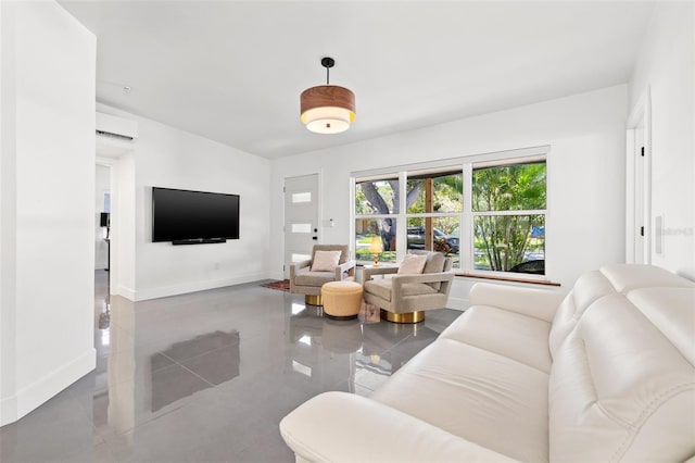 310 55th Ave S, Saint Petersburg, FL 33705 - living area with a wall mounted air conditioner and baseboards