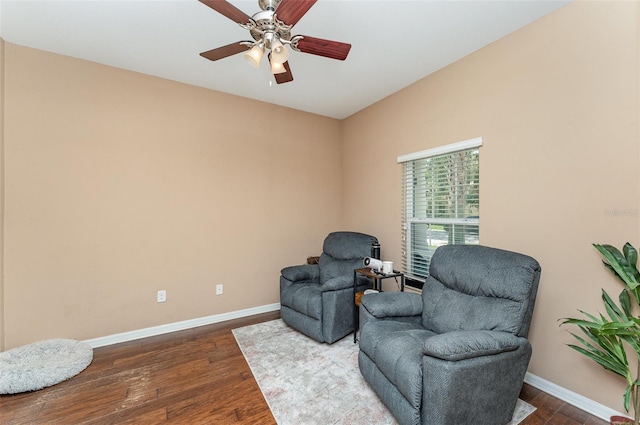 11206 Coventry Grove Cir, Lithia, FL 33547 - living area with dark wood-style floors, baseboards, and a ceiling fan