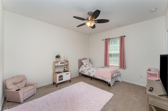 11206 Coventry Grove Cir, Lithia, FL 33547 - bedroom featuring light colored carpet, baseboards, and ceiling fan