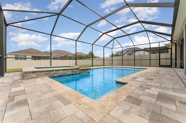 11206 Coventry Grove Cir, Lithia, FL 33547 - view of swimming pool featuring a patio, a lanai, a fenced backyard, and a pool with connected hot tub