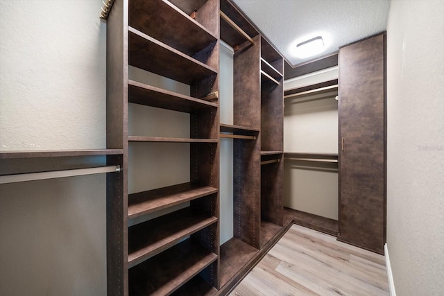 215 18th Ave, Indian Rocks Beach, FL 33785 - walk in closet with wood finished floors