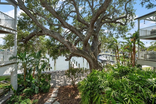 215 18th Ave, Indian Rocks Beach, FL 33785 - view of yard featuring a balcony and a water view
