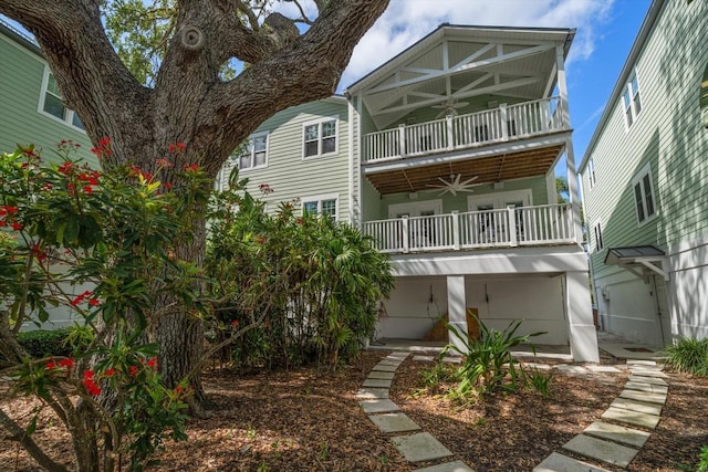 215 18th Ave, Indian Rocks Beach, FL 33785 - back of property featuring a balcony and a ceiling fan