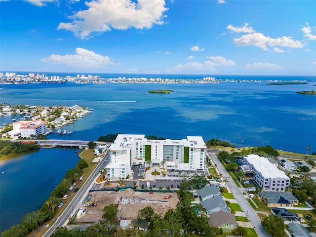1020 Sunset Point Rd Unit 410, Clearwater, FL 33756 - aerial view of property's location featuring a nearby body of water, apartment complex, and nearby urban area