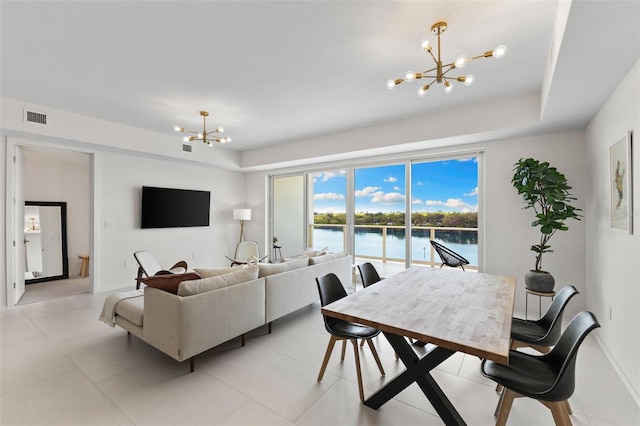 1020 Sunset Point Rd Unit 410, Clearwater, FL 33756 - living area featuring a chandelier