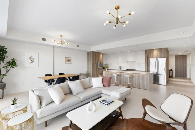 1020 Sunset Point Rd Unit 410, Clearwater, FL 33756 - living area with a chandelier and recessed lighting