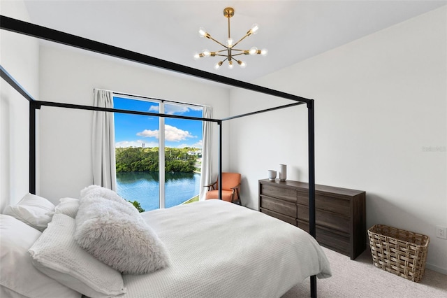 1020 Sunset Point Rd Unit 410, Clearwater, FL 33756 - carpeted bedroom with a chandelier