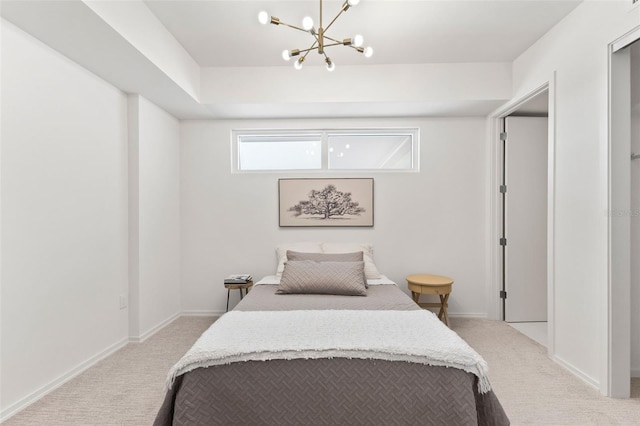 1020 Sunset Point Rd Unit 410, Clearwater, FL 33756 - carpeted bedroom with a chandelier and baseboards